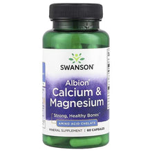 Swanson Albion Calcium & Magnesium supplement bottle with front label and green capsules
