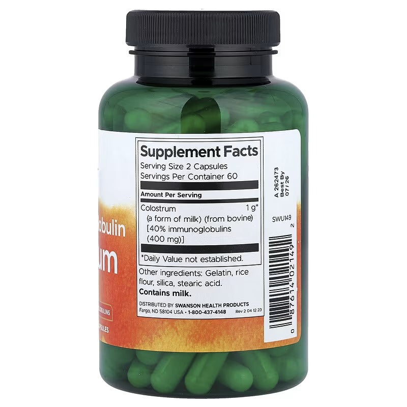 Swanson colostrum supplement facts label on back of bottle with capsules