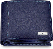 Men's navy leather bifold wallet, pebble-grain close-up and metal logo plate.
