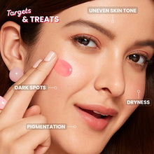 DOT & KEY face serum applied to skin with fingertips, showing glossy pink gel