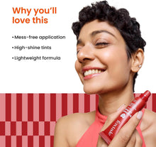 Peptide lip balm in ruby red, SPF 30 tube held near smiling lips