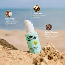 Moxie frizz-fighting hair serum bottle on sandy beach with ingredient labels