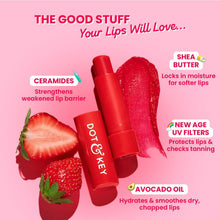Red tinted SPF 50 lip balm in a slim tube with strawberry accents