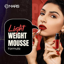 Matte red liquid mousse lipstick on lips with product bottle