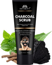 INTIMIFY charcoal scrub tube with green leaves and activated charcoal chunks