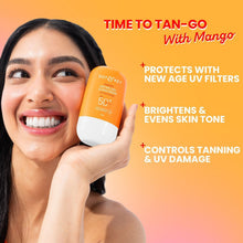 DOT & KEY Mango detan gel sunscreen SPF 50+ PA+++ 50g in hand, orange bottle