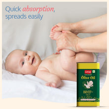 LuvLap Naturals baby olive oil massage can next to massaged newborn