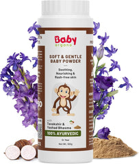 Talc-free baby powder bottle with beige powder beside it