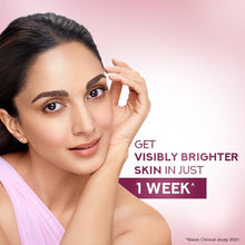Brightening serum applied to face on woman