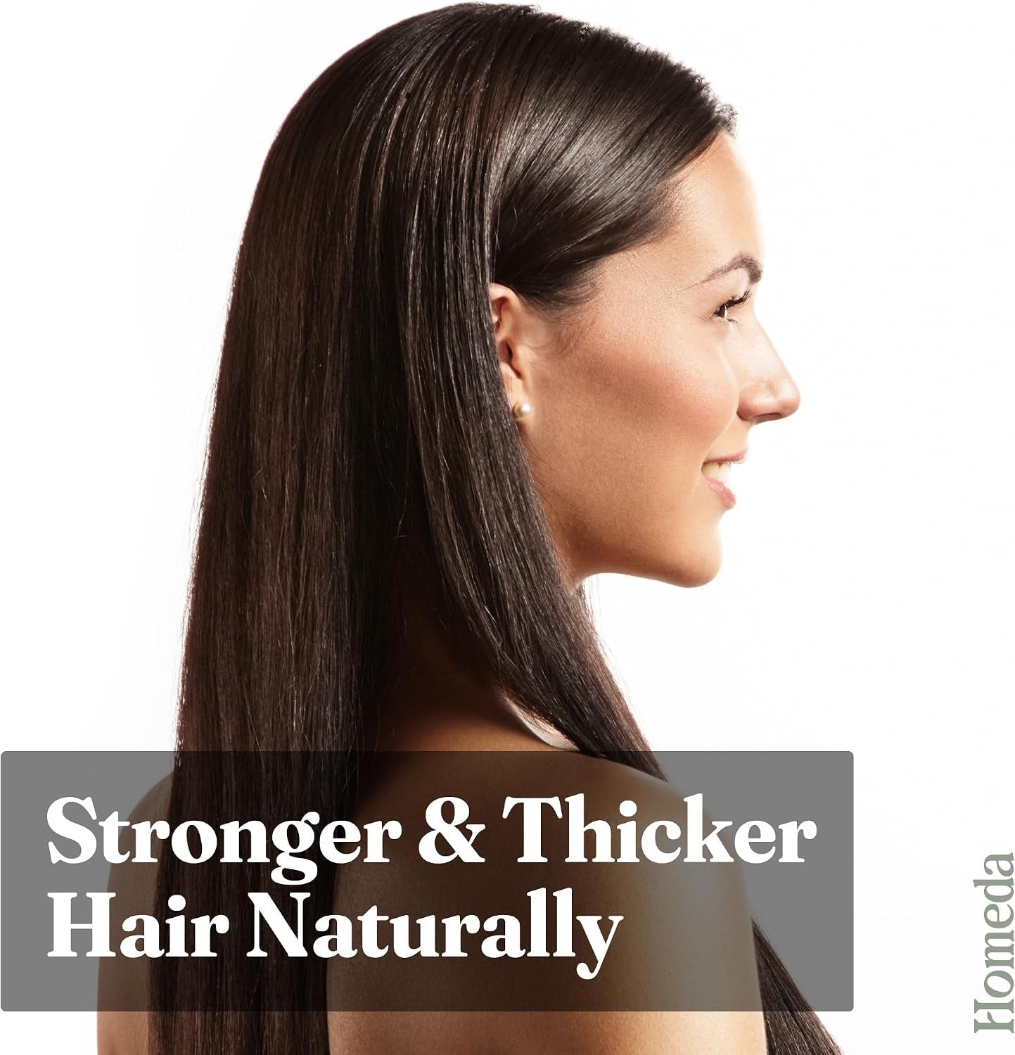 Castor oil hair care on long dark hair, side profile of a woman.