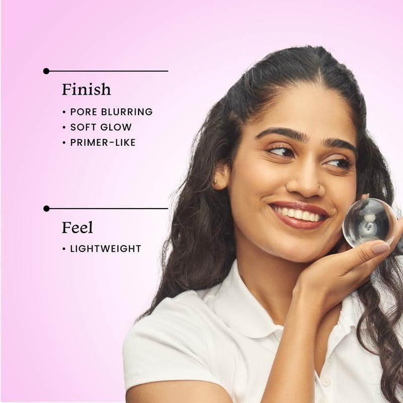 Foxtale niacinamide face serum bottle in hand, purple