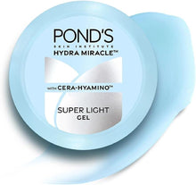 Pond's Hydra Miracle light gel in blue jar, front label and scoop