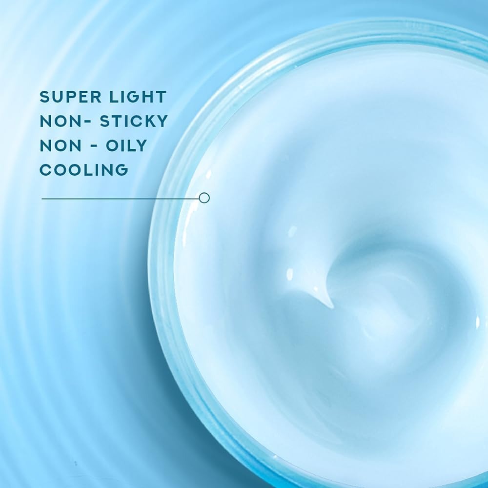 Light blue gel moisturizer in open jar, close-up of smooth gel swirl