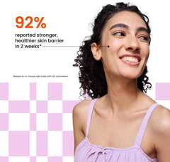 Face moisturizer application: smiling woman holding tube near cheek, showing lightweight care