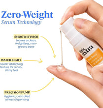 Vitamin C face serum bottle with clear gel droplet, held in hand