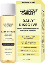 Oil face cleanser bottle with white cap and yellow-gold liquid, labeled Daily Dissolve