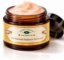 Amber glass face cream jar with black lid, filled with pale peach cream