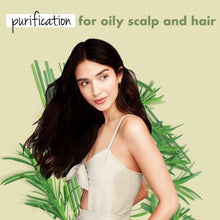 Purifying shampoo concept on long dark hair with herb plants