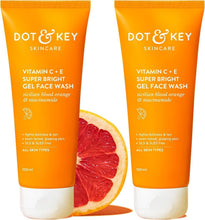 Two orange Vitamin C + E gel face wash tubes with white caps side by side