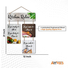 Kitchen rules wall hanging with four wooden quote panels and leafy top accent