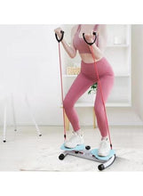 Exercise trainer with blue foot pads and red resistance bands, person standing