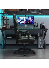Black reclining gaming chair with armrests and swivel base