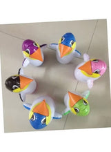 Inflatable penguin tumbler boxing toy set showing several penguins on the floor