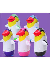Inflatable penguin boxing toys set of four in white with purple, pink, and black bodies