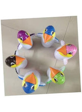 Set of inflatable penguin boxing toys with colorful heads and beaks