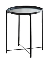 Round black metal side table with tray top and three legs