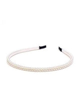 White beaded girls' headband with black end connectors