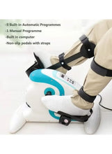 White and teal motorized exerciser with non-slip pedals and adjustable leg straps