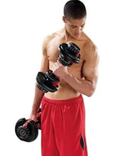 Adjustable dumbbells, stacked black plates with red handle accents, held overhead