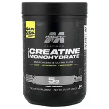 Creatine monohydrate supplement tub, black with yellow and white front label