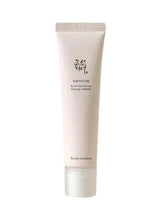 Eye serum tube in light beige with cap and narrow nozzle applicator