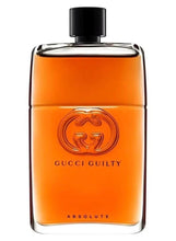 Orange eau de parfum bottle with black cap and Gucci crest, 'ABSOLUTE' label