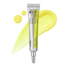 Retinal tightening booster serum tube with silver cap and yellow squeeze drops