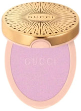 GUCCI glow highlighter compact in frosted lilac with gold star-pattern lid