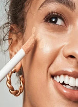 Liquid filter swatch on skin with doe-foot brush applicator