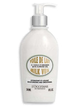 Almond milk veil lotion bottle with white pump, pale beige label