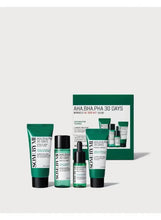 Acne care skincare travel set with green cleanser tube and serum bottles, boxed edition