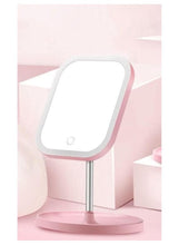 Pink LED makeup mirror with tilt frame and round base