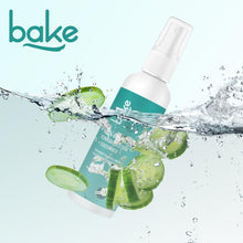 Glycolic acid toner spray bottle with water splash and cucumber graphics
