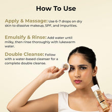 Woman applying oil face cleanser from a white-capped bottle during cleansing
