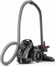 Black bagless vacuum cleaner with long flexible hose, wand, and floor head
