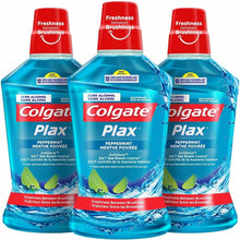 Pack of 3 Colgate Plax peppermint mint mouthwash bottles, blue with red caps