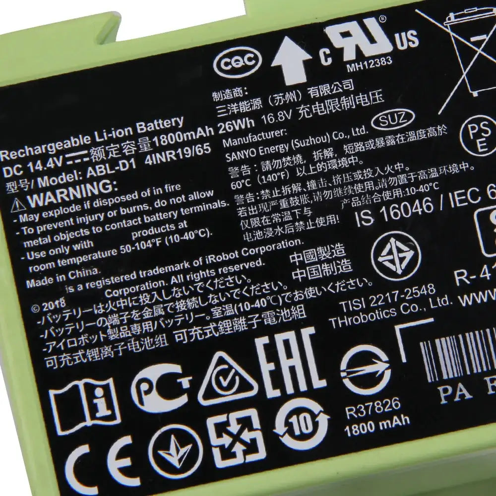 iRobot Roomba replacement battery close up of green casing label showing 14.4V 1800mAh specs and safety symbols