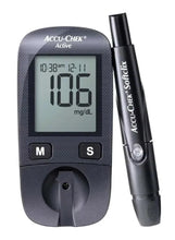 Blood glucose meter with display showing numbers and mg/dL, plus lancet pen