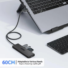 Acer powered USB hub splitter with ports connected to a laptop via cable