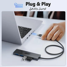 Acer powered USB hub splitter plugged into a laptop with four ports